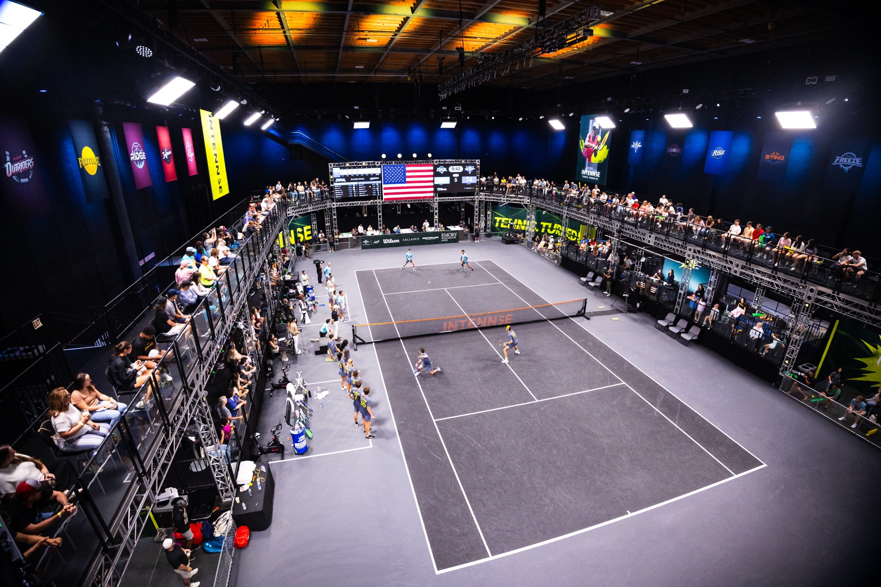 INTENNSE Arena during a match, the crowd close to the court